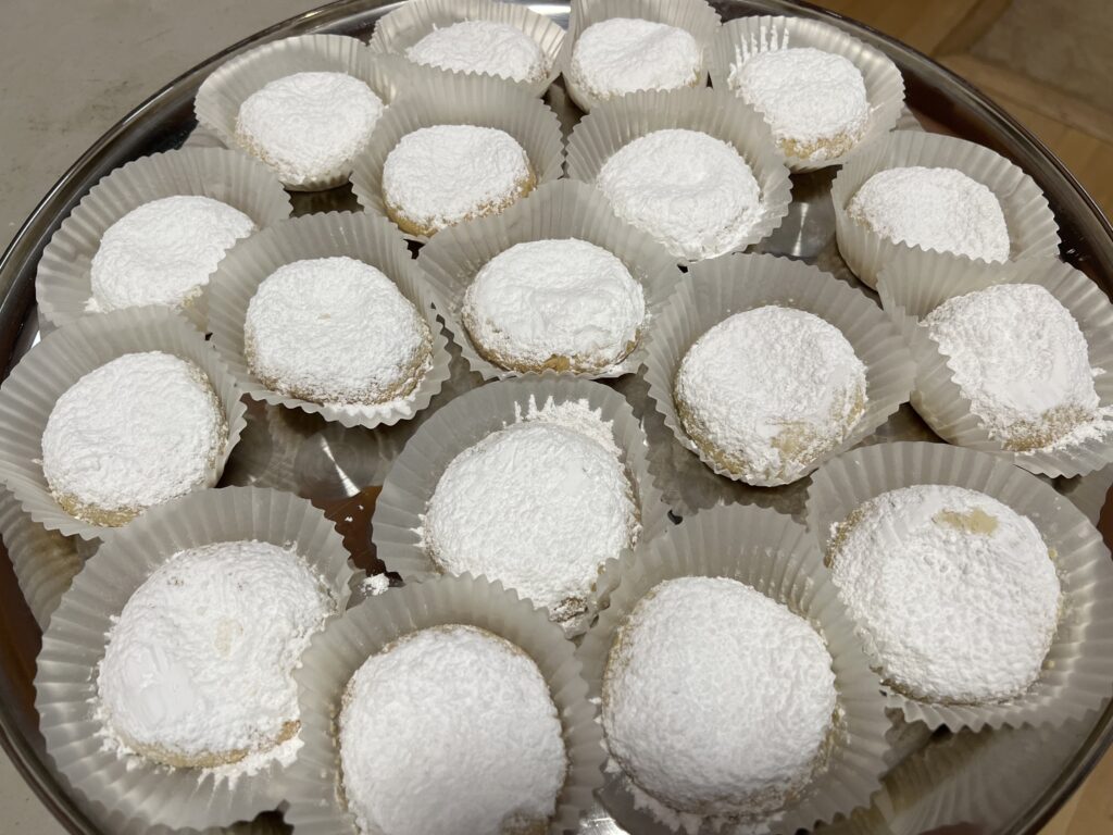 Almond cookies topped with powdered sugar
